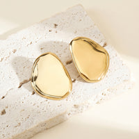 Boucles d'Oreilles Ovales Sculptées — Statement Dorée