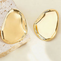 Boucles d'Oreilles Ovales Sculptées — Statement Dorée
